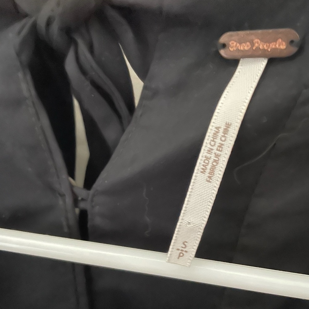 Free People long sleeve, dainty blouse with button up back.